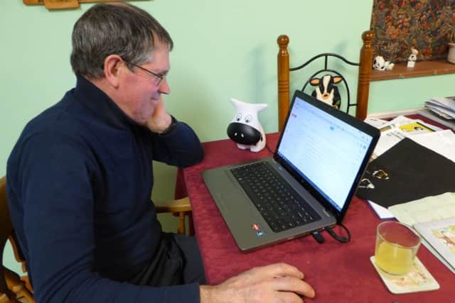 Farmer on his laptop