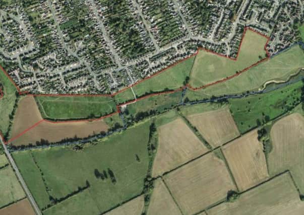 The red lines on this aerial shot show the proposed development site boundary