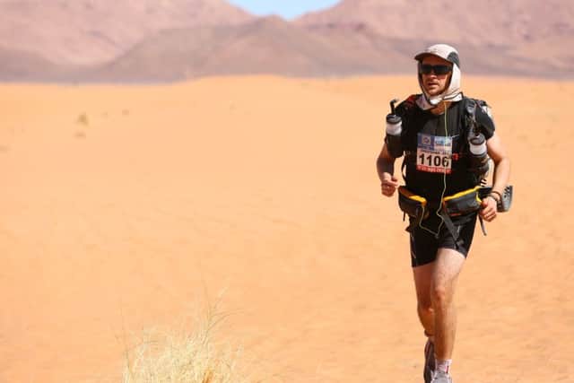 Chris Patterson running through the Sahara during the Marathon des Sables.