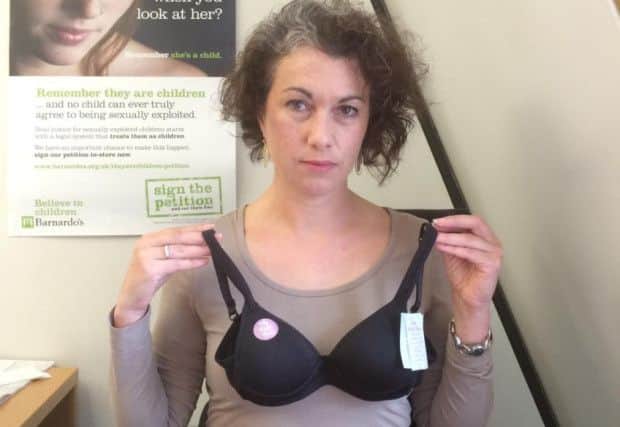Sarah Champion MP with the children's bra which she says is "too sexualised" NNL-160513-101002001