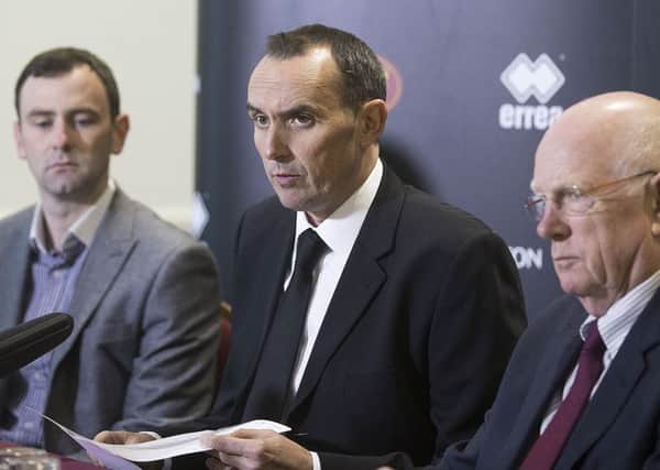 DECISION TO MAKE - Cobblers chairman Kelvin Thomas, pictured with chief executive James Whiting (left) and non-executive director Mike Wailing