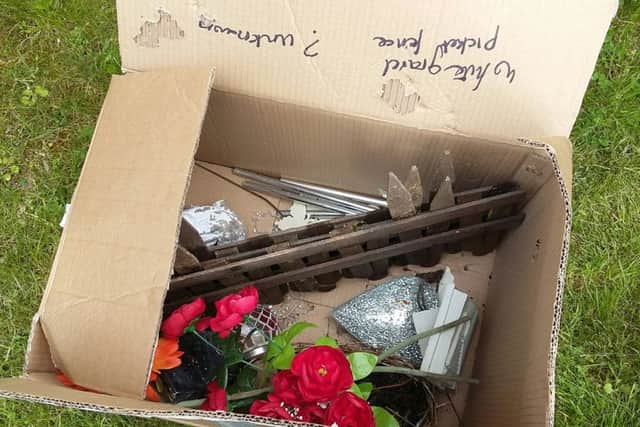 The items taken included hearts, flowers and a small model fence.