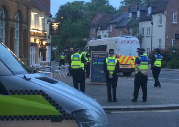 Police at the scene in Daventry town centre