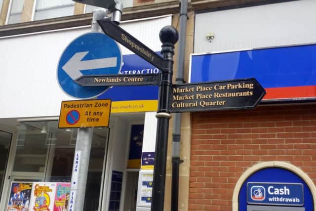 The current town centre signs.