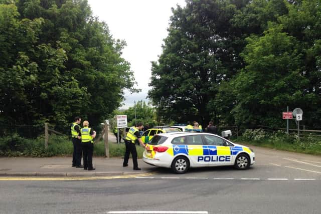 Police dealing with the incident in Spencer Bridge Road, Northampton NNL-160526-121925001