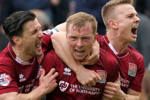 SPECIAL SEASON - Nicky Adams celebrates scoring his goal in the 2-2 draw with Bristol Rovers in April