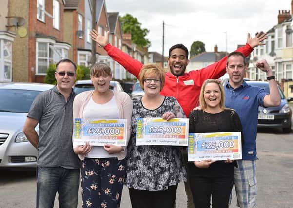 People's Postcode Lottery winners Michelle Parry, Liz Kennelly and Heidi Barham from Wellingborough with lottery ambassador Danyl Johnson