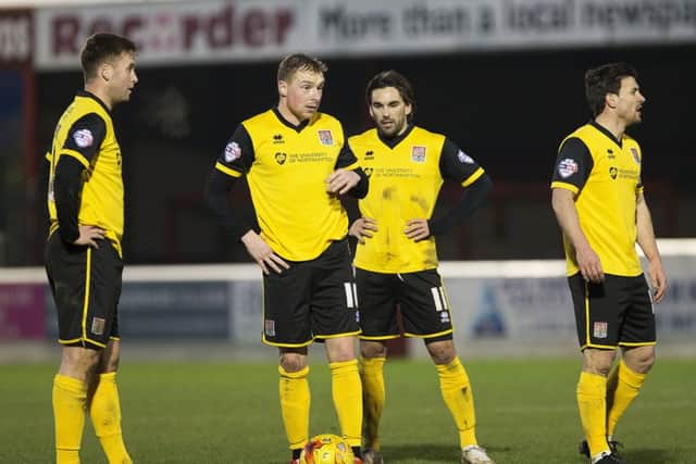 Nicky Adams may have left Sixfields, but he is confident the Cobblers will succeed in league one next season