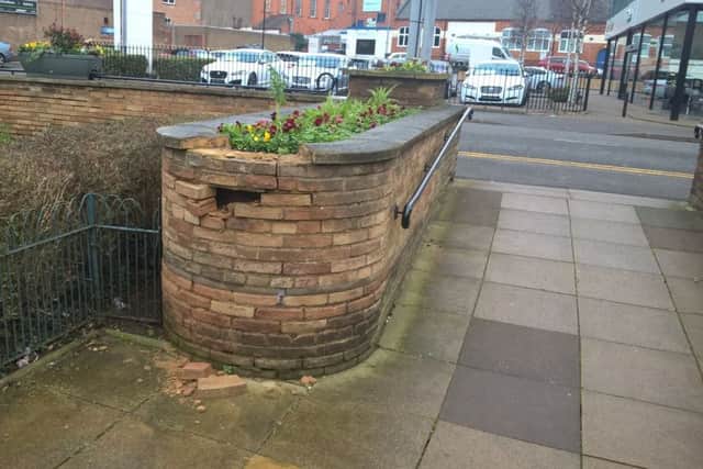 ...And a brick falls loose.