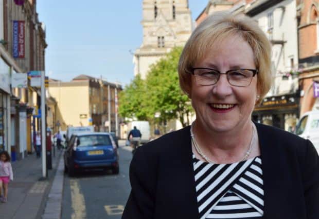Northampton Borough Council leader Mary Markham says she does not agree with the county council's plans to delay setting up unitary authorities.