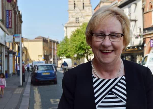 Northampton Borough Council leader Mary Markham says she does not agree with the county council's plans to delay setting up unitary authorities.