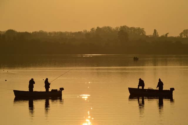 Barry Richardson from Isham in Northamptonshire - Anglers enjoying the last of the light at Pitsford Water to the north of Northampton.