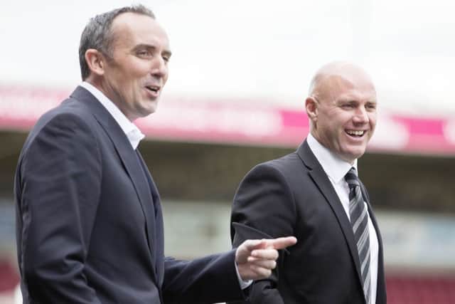 Cobblers chairman Kelvin Thomas (left) and manager Rob Page
