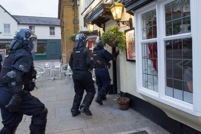 The raid by police at the pub in May. Photo by Northamptonshire Police