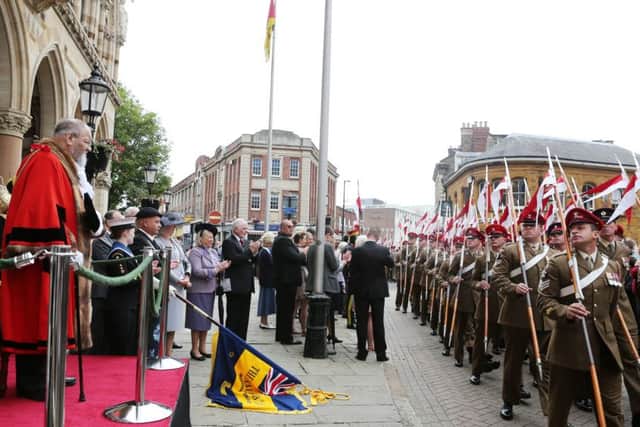 The 9th/12th Royal Lancers parading through Northampton in 2014 after returning from an eight month tour of the Helmad Province, Afganistan. NNL-140629-234644005