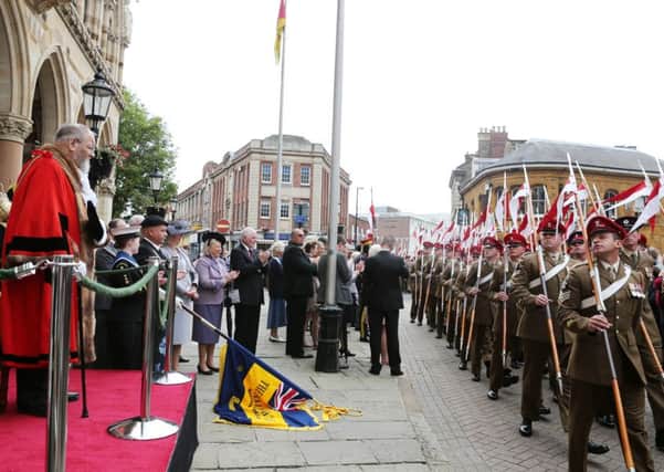 The 9th/12th Royal Lancers parading through Northampton in 2014 after returning from an eight month tour of the Helmad Province, Afganistan. NNL-140629-234644005