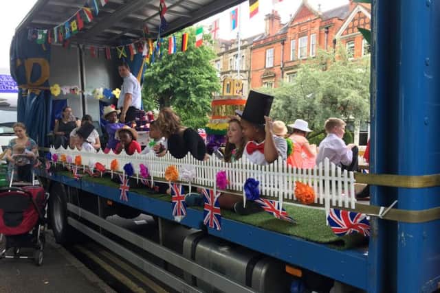 Around 30 youngsters took part in workshops decorating a float and creating costumes to celebrate the Queens 90th birthday - thanks to the Fair Deal for Kids fund.
