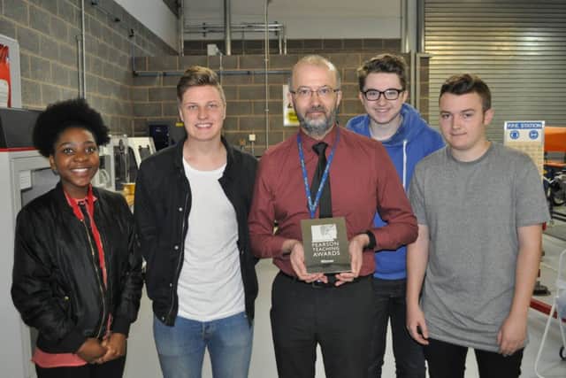 Neil Tobin was presented with a Silver Award at the Pearson Teaching Awards yesterday.