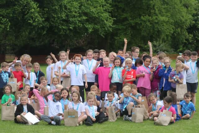 Mears Ashby school pupils and parents ran a Race For Life
