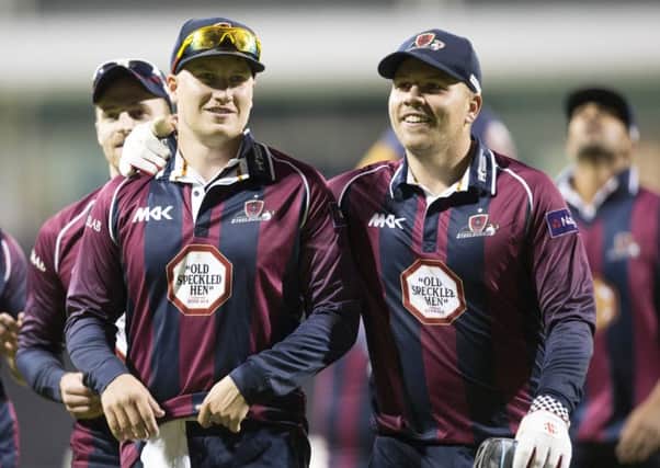 Josh Cobb (left) walks off the field after helping the Steelbacks to the win obver Durham last week