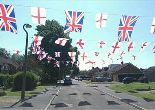 Michelle Young took this snap of the bunting on her street in Billing - just days before she was told to take the bunting down for being a road 'hazard'.