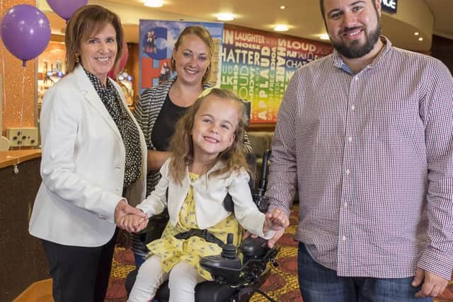 Beacon Bingo customers and staff raised money for CHIPS charity to buy a wheelchair for Isobelle Philora