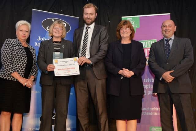 Jane Hayward of Textbook Creative presents Manor School Sports College with their Secondary School of the Year award.PICTURE: ANDREW CARPENTER