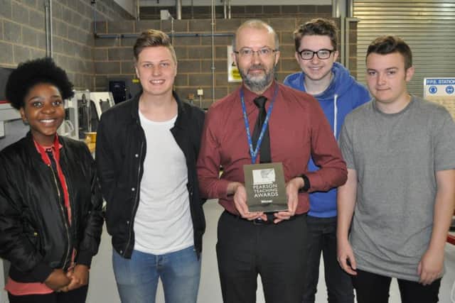 Neil Tobin with his Lecturer of the Year 2016 award