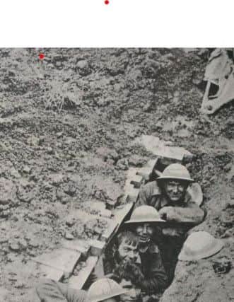 Soldiers in a dug-out near the front line.