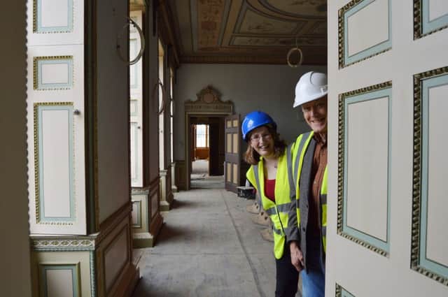 Work has been progressing in the south rang of Delapre Abbey. Pictured are cabinet member for regeneration at Northampton Borough Council, Councillor Tim Hadland and Vikki Pearson of the Delapre Abbey Preservation Trust.