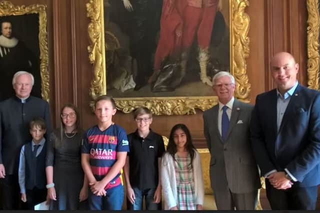 The winners receive their prizes from Northamptonshire Lord Lieutenant David Laing, county council chairman Councillor Jim Harker and cabinet member for childrens services Councillor Matthew Golby.