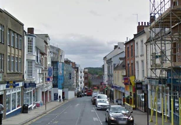 An 18-year-old man was left unconcious after a violent assault in Bridge Street. The three men who carried out the beating have been spared jail.