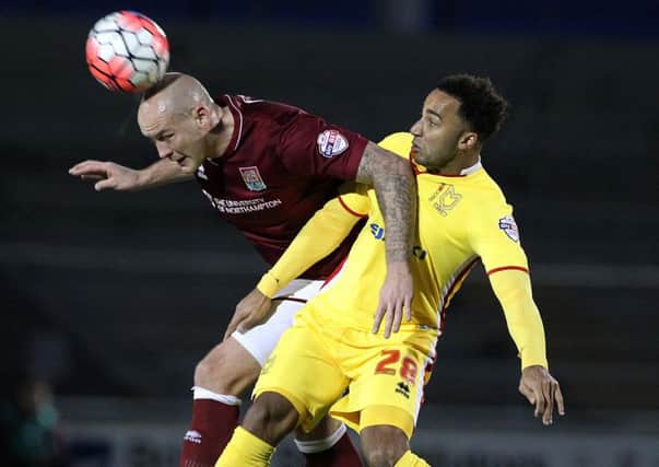 Action from last season's FA Cup third round clash between the Cobblers and Milton Keynes Dons at Sixfields