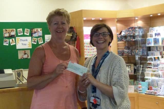 Jane Brodie presented over £3,000 to Cynthia Spencer Hospice