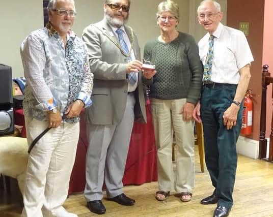 Janice and Roy Peasland were presented with a bronze statuette of a guide dog for their 40 years of service to Northampton guide dogs
