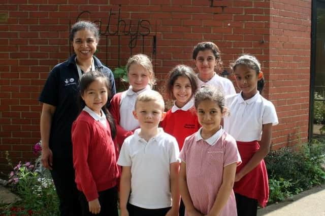 Danielle Reeves, the new community development worker, with children from Lumbertubs School