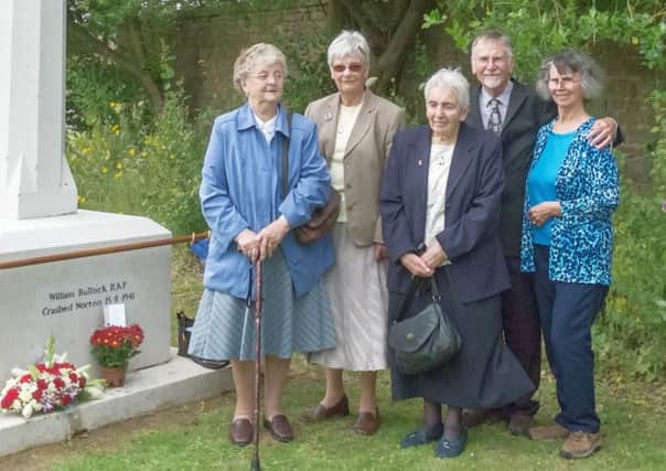 Relatives at the war memorial in Norton. Photos by Richard Oliver