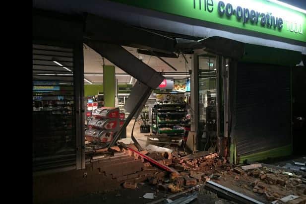 Thieves used a digger to smash into a Co-op in Wollaston. Pic by Sgt Darron Bishop