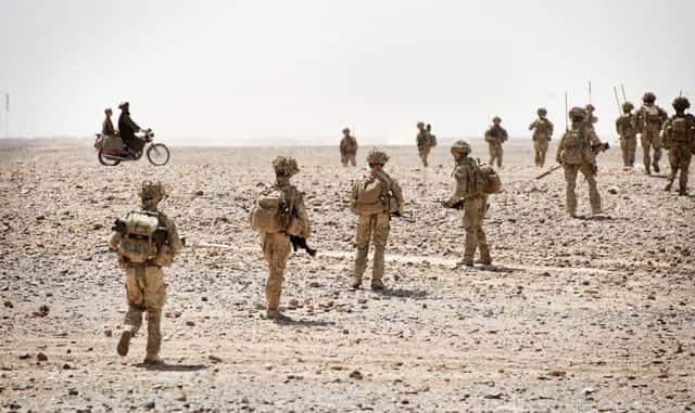 Soldiers of the Poachers (more formally known as C Company,  2nd Battalion the Royal Anglians) in Afghanisatan in May 2014. Photo by Corporal  Daniel Wiepen.