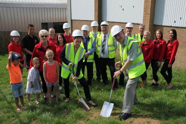 Phoenix Centre President Elaine Bedford and Councillor Alan Hills cut the first sods of turf for the Phoenix Centre extension, joined by representatives from the Phoenix Centre and Daventry District Council