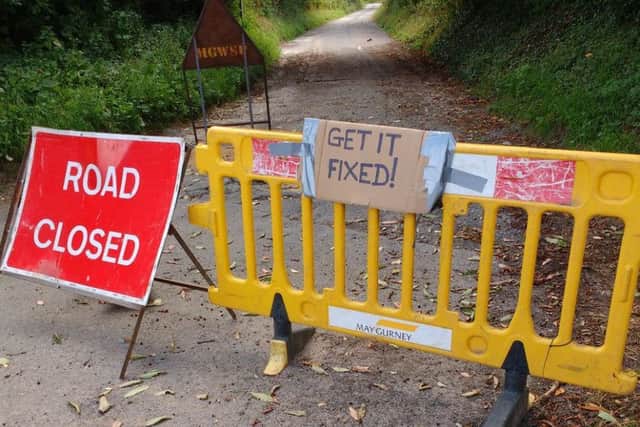 The junction of Spring Lane and Nether Lane in Flore has already been sot for over a month - and it may not reopen again until late August.