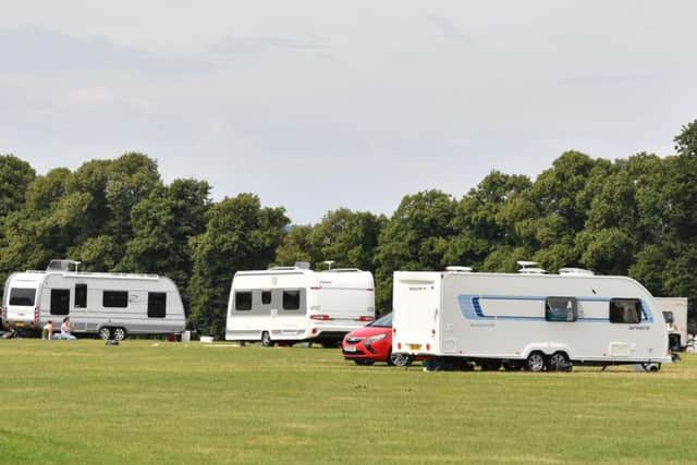 A group of travellers have pitched up non The Racecourse in Northampton