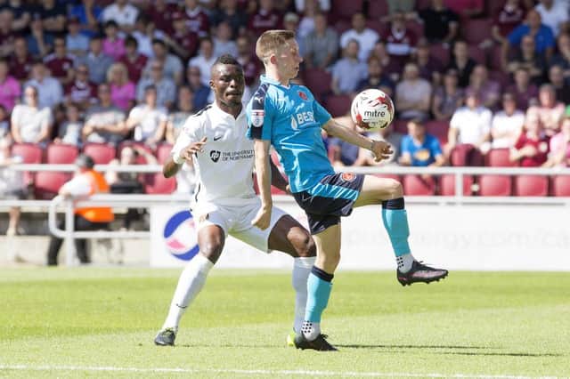 Zakuani in action on his Cobblers debut at the weekend. Picture by Kirsty Edmonds