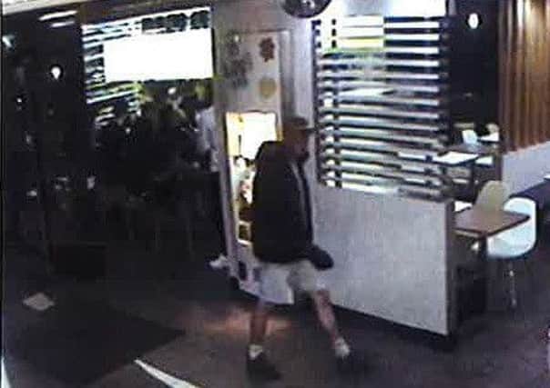 A CCTV image has been released of a man after a robbery at McDonalds, Sixfields in Northampton