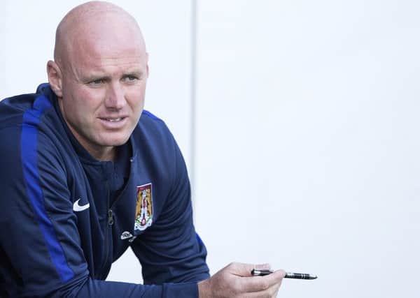 Rob Page is looking forward to seeing his Cobblers players test themselves against Barnsley (picture: Kirsty Edmonds)