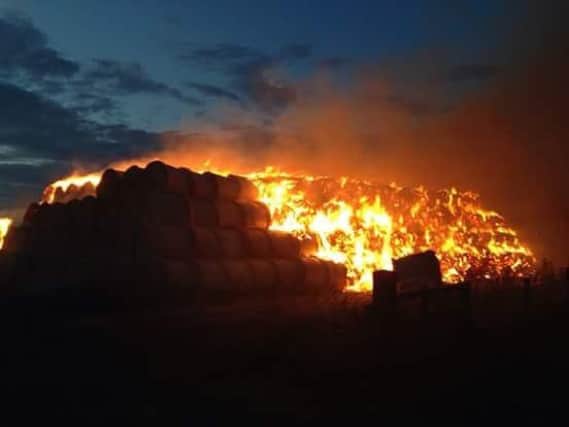 Police are appelaing for witnesses to an arson attack on a stack of hay bales in a field near Ecton