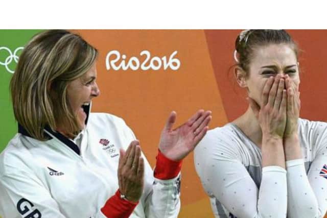 Tracy Whittaker-Smith (left) celebrates with Bryony Page as the 25-year-old won Great Britains first-ever Olympic medal in trampolining on Friday night
