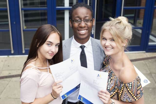 A Level Results - Malcom Arnold Academy, NorthamptonL-R Wiktoria Liskowska, Leeford Dean and Gemma Johnson NNL-160818-114240009