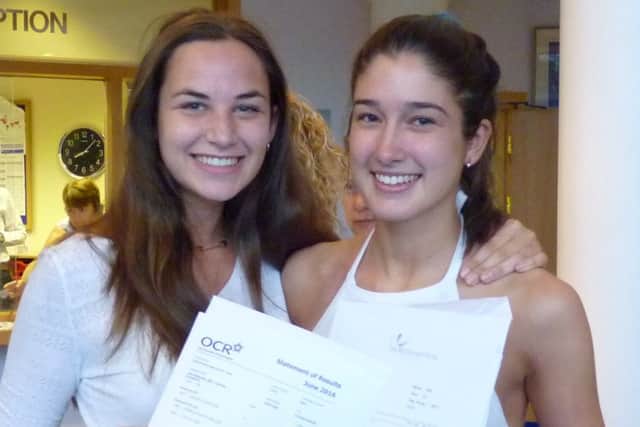 Emily Von Widekind and Alice Malin pick up their A-level results at Northampton High School.