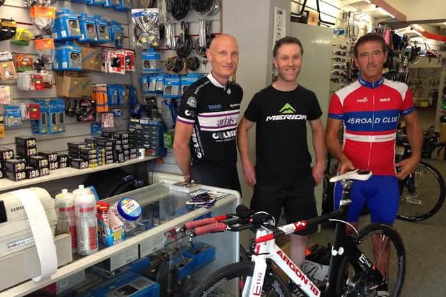 Neil Barford and Kev Hardwick are taking part in a 2,200 race around Ireland. Pictured with Stuart Burke (centre) owner of Newlec cycles in Northampton